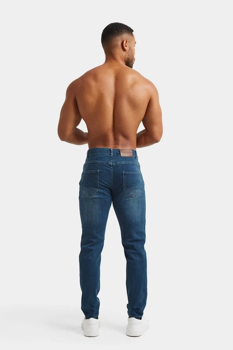 Athletic Fit Jeans in Mid Blue